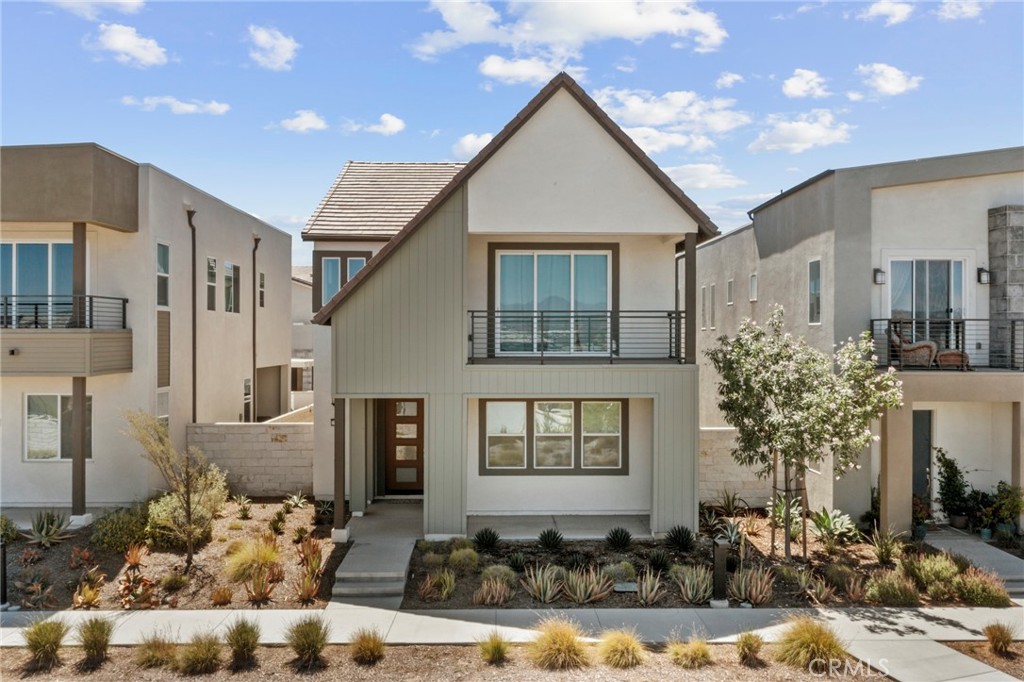 Modern Elegance Meets Resort-Style Living in Valencia FivePoint!
Venture into this beautifully designed 3-bedroom, 2.5-bathroom home located in the sought-after Siena neighborhood of Valencia’s FivePoint community. Built in 2022, this move-in ready residence showcases a bright open-concept layout filled with natural light, soaring ceilings, and tasteful upgrades throughout. The spacious great room blends seamlessly with a designer kitchen that features a massive quartz island, custom backsplash, soft-close cabinetry, smart stainless steel appliances, a double-door pantry, and an upgraded water filtration system—ideal for daily living and entertaining alike.
Enjoy effortless indoor-outdoor living with an oversized glass slider opening to a private yard and patio space—perfect for relaxing, dining al fresco, or simply soaking up the sunshine. Upstairs, you'll find a versatile loft/family area, a generously sized laundry room, and all three bedrooms including a luxurious primary suite. The primary retreat boasts expansive mountain views, a private balcony, walk-in closet, and spa-inspired ensuite with dual vanities, quartz finishes, and a separate tub and shower.
Additional highlights include upgraded wood flooring, designer carpet upstairs, recessed lighting, plantation shutters, solar panels, a tankless water heater, Ring doorbell and security system. Located on a premium view lot within the community, this home offers both style and efficiency.
Live the FivePoint lifestyle with access to Confluence Park, featuring multiple pools, spa, clubhouse, gardens, BBQ areas, cabanas, playgrounds, trails, and more. All within minutes to award-winning schools, shopping, dining, and freeway access—making this the perfect blend of luxury and convenience in the heart of Santa Clarita.
Don’t miss this opportunity—schedule your private showing today!