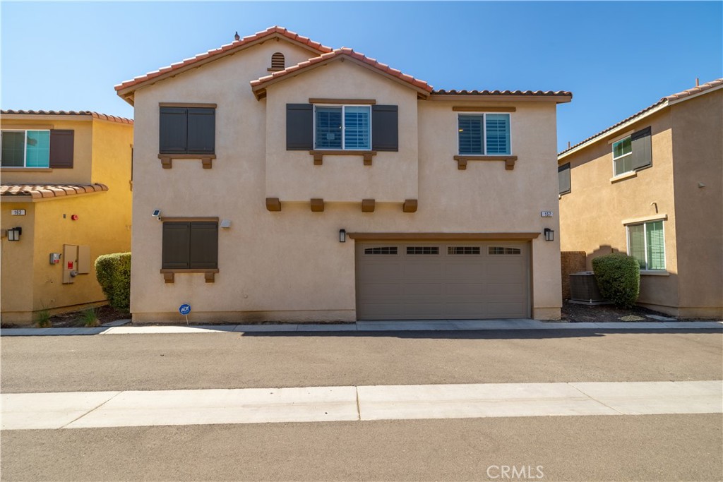 GATED COMMUNITY! GREAT LOCATION! MOVE-IN READY! Welcome to 157 Ambrosia Ct., a beautifully maintained home nestled in the desirable gated community of Pacific Avenue, in Perris. This charming 3-bedroom, 2.5-bath home offers the perfect blend of comfort, style, and security. This home features a spacious open-concept layout with a light-filled living area, modern kitchen with granite countertops, and a cozy dining space perfect for gatherings. Upstairs, the oversized primary bedroom has a large en-suite bathroom withdual vanities, and an extra large walk-in closet. Two additional bedrooms, a bright full bath, and office “nook” make it convienent for offering plenty of room for family, guests, or a home office. Upstairs Laundry room is a huge bonus to make your life easier! Step outside to a private backyard patio area, ideal for relaxing or BBQ’ing dinner! Enjoy peace resort-style living with access to top-tier community amenities including a sparkling pool, spa, clubhouse, fitness center, playgrounds, and walking trails—and peace of mind within a secure, gated community. Conveniently located near Lake Perris, schools, shopping, and dining, this home offers a rare opportunity to enjoy comfort, community, and convenience all in one.