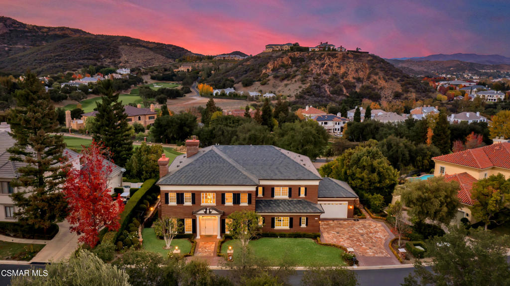 Please Inquire about available Seller Financing and visualize this amazing Dream Home become your very own! A million dollars have been spent renovating this stunning home with panoramic views overlooking the Third Fairway behind the gates of Sherwood Country Club. The interior of this 4 Bedroom, 4.5 Bath Home Plus Bonus Room has been completely renovated using the finest finishes and craftsmanship and shows like a brand new model home. A Light and Bright Entry welcomes you to a two story foyer with gleaming hardwood floors flanked by the Formal Living and Dining Rooms adjacent to the Great Room Kitchen and Family Room. Large center island with seating, fabulous views, Dual Oven Wolf Range plus additional third Wolf oven and microwave. Dual Dishwashers, Walk In Pantry, Sub Zero Fridge and Freezer, Lovely Bar with contrasting cabinetry and Informal Dining Area. A Downstairs Bedroom Suite with amazing views is perfect for guests. The remodeled wrought iron staircase guides you to the second story that has views from every room upstairs. The Primary Suite is an absolute dream featuring a marble hearth fireplace, large balcony to enjoy the breathtaking views, a rotunda sitting area and the most gorgeous spa like retreat with an ombre mosaic wall highlighting the soaking tub, large shower, separate vanities and dual walk-in closets fit for Hollywood royalty, all designed with the finest cabinetry and materials with no expense spared. Two Additional Designer Perfect Bedroom Suites, a Spacious Bonus Room and Laundry Room complete the Upstairs. Every room has been completely renovated with decorator finishes. The designer details throughout are absolutely stunning. Enjoy endless views of the golf course and the mountains from the Entertainers Yard featuring an infinity edge pool with spa, grassy area, BBQ peninsula, firepit with built in seating and covered patio. All furniture and accessories were custom made for this home and being included in the price, including the workout equipment in the home gym. Dual two car garages provide indoor parking for 4 vehicles and plug in for easy EV charging. Sonos Sound System and much more. This is the Sherwood home you have been waiting for -- true Sophistication and Elegance.