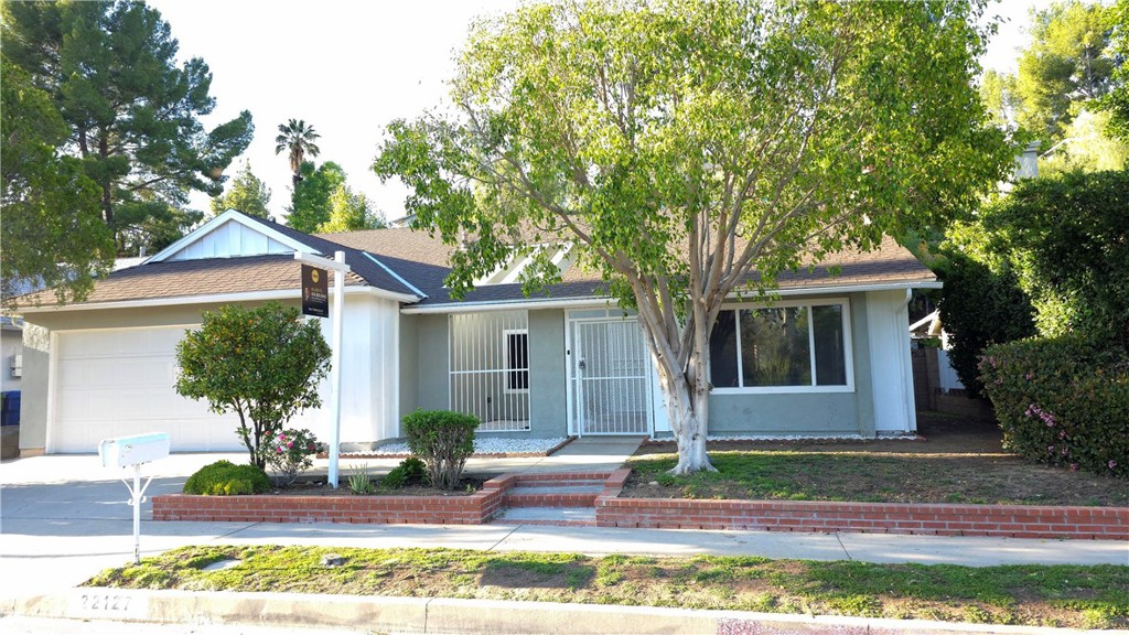 Now Showing – Beautifully Updated Home with Modern Upgrades
Welcome to this charming single-story residence located in the highly sought-after community of Chatsworth. This thoughtfully maintained home features 4 spacious bedrooms, 2 full bathrooms, a welcoming family room, and a dedicated dining area—perfect for both everyday living and entertaining. Recent upgrades include a brand-new kitchen countertop, fresh interior and exterior paint, updated bathrooms, newly painted garage interior, and enhanced landscaping for excellent curb appeal. Step through the secure iron-gated courtyard, surrounded by a professionally landscaped front yard with elegant brick planters. Inside, the open floor plan invites you in with natural travertine stone flooring in the foyer, kitchen, and family room, while the remaining areas feature durable, wood-look laminate flooring. Smooth, flat ceilings throughout the home add to the modern feel.
A large 18-inch solar tube floods the space with natural daylight. The updated kitchen includes a premium 6-burner stove with grill and hood, a deep stainless-steel sink with a modern faucet and disposer, and a matching stainless dishwasher. The dining area, complete with a ceiling fan and light fixture, connects to a cozy living room featuring a fireplace. An additional solar tube in the hallway adds even more brightness to the home. The master suite offers a full wall of mirrored closet doors, a spa-style bathtub with shower, and dual vanities. The second full bathroom also includes a bathtub and sink. A 2-car attached garage provides direct access and includes a laundry area. This beautifully upgraded home is move-in ready and offers both style and comfort. Don’t miss your chance to make it yours—schedule a tour today!