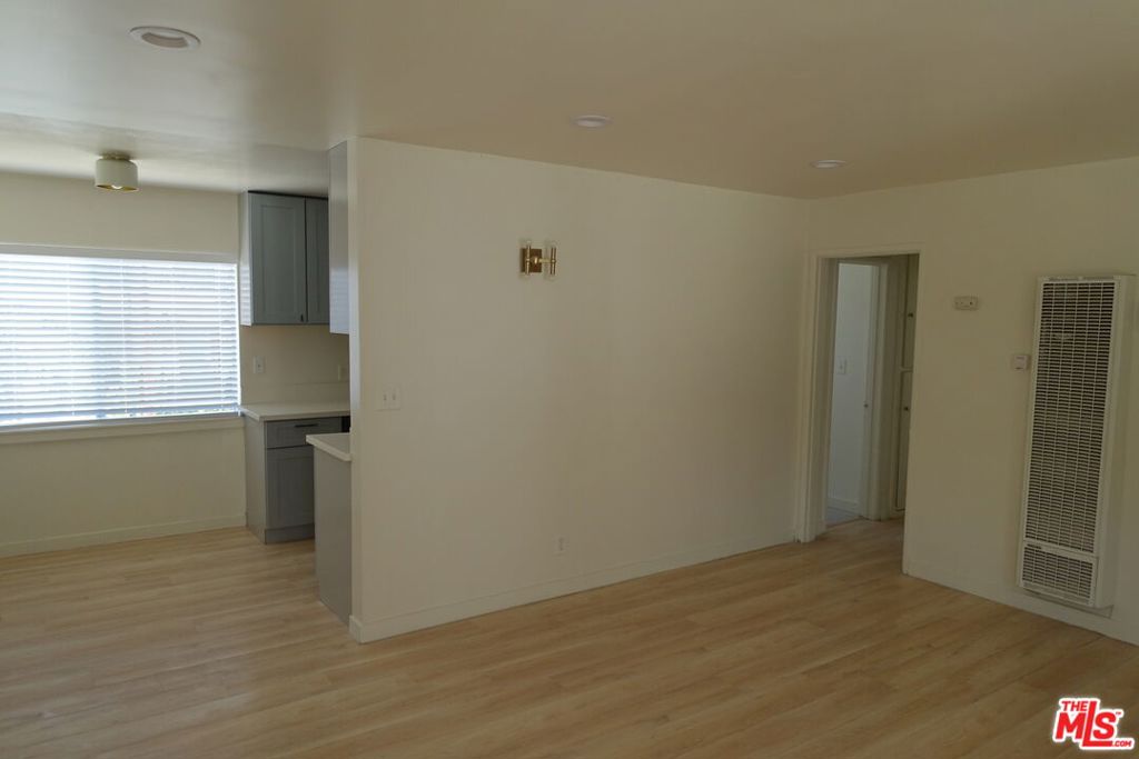 Welcome to this charming two-bedroom, two-bathroom apartment located in the heart of Highland Park. This bright and inviting unit offers an open living and dining area with large windows that fill the space with natural light. The updated kitchen features ample cabinet storage and counter space, making it both stylish and functional. Both bedrooms are generously sized, and the bathrooms are updated. Enjoy the convenience of on-site parking and shared laundry facilities, plus easy access to the vibrant York Boulevard filled with trendy cafes, shops, and dining. Just minutes from the Metro Gold Line and major freeways, this location makes commuting simple while keeping you close to the best of Northeast LA living
