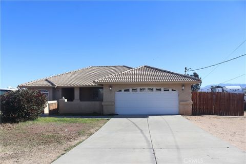 Photo of 11243 Pinon Avenue, Hesperia, CA 92345 (MLS # CV25277448)