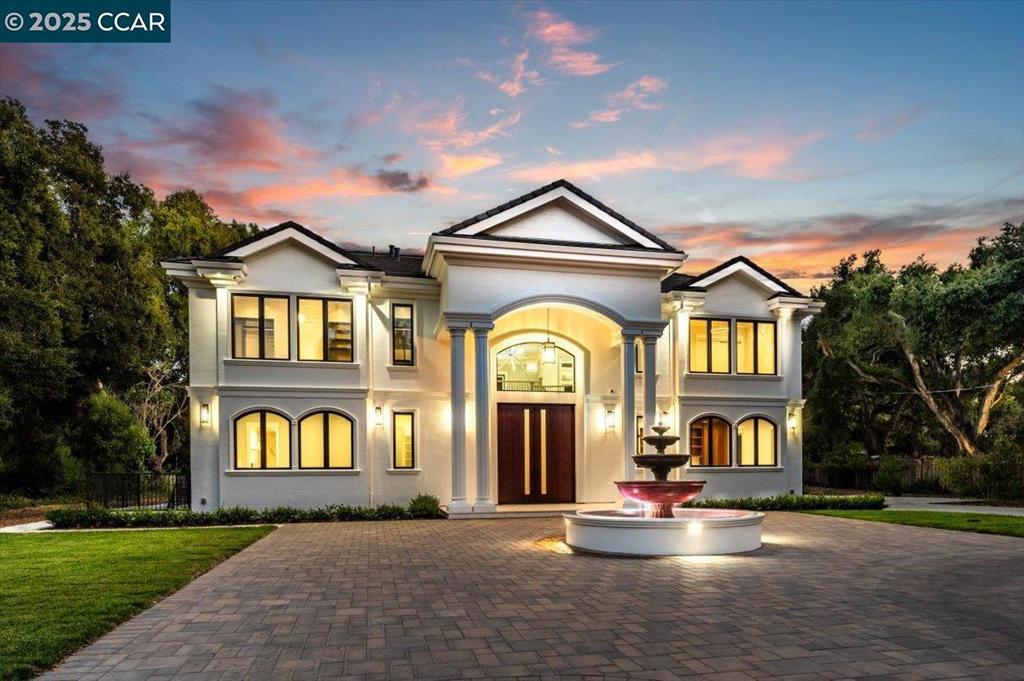 Discover sophisticated living in this newly built, solar-powered 8,297 sq ft estate on over an acre in Atherton. This residence offers 7 bedrooms, 7.5 bathrooms, and a guest house with 2 bed/2 bath. A gated entry, circular driveway, and fountain welcome you. Inside, a grand curved staircase leads to the luxurious primary suite with a fireplace and spa-like bathroom. The expansive patio features a fireplace, solar-heated 40' lap pool, Jacuzzi, terrace, mini golf, and an entertainment cabana. The lower level boasts a movie theater, sauna, gym, and wine cellar. The gourmet kitchen includes high-end appliances, a prep kitchen, and a 12-foot island seamlessly connecting to the family room. Located ideally between San Francisco and Silicon Valley, it's also close to Stanford University and tech hubs.
