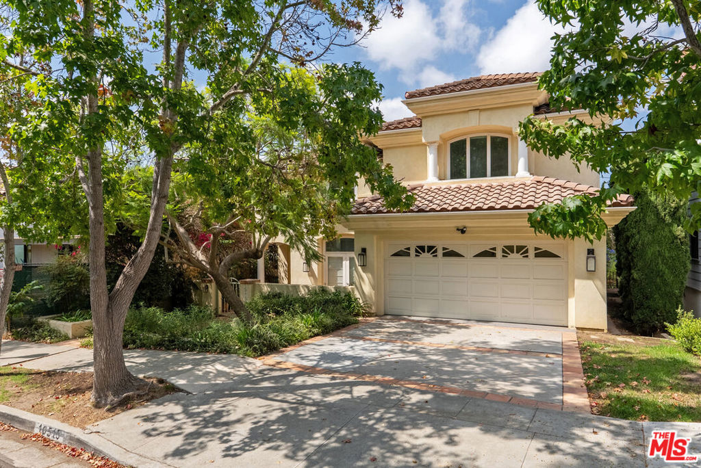 A beautiful 4 bedroom, 3.5 bathroom home in Cheviot Hills with a spacious yard. On the main level, the large chef's kitchen opens to the family room and breakfast room, around the corner is the laundry and guest quarters. The formal living room and dining room are surrounded by windows with views of the back yard and front garden. There are 3 bedrooms and two bathrooms on the upper level, a large primary bedroom, bath and closet featuring dual fireplace. The two additional rooms on the upper level each have their own large closets and share a large bathroom. This spacious, bright and light filled home is perfect for your next residence steps from Rancho Park. Welcoming you behind the gate with a courtyard and fountain, this home is a rare opportunity to live in one of the best pockets in Los Angeles.