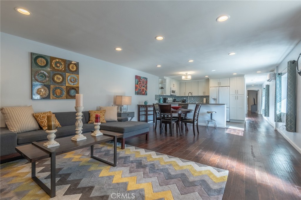 Perched in the hills above Studio City, this beautifully renovated home showcases sweeping views of the Valley and surrounding hillsides. Inside, the open-concept floor plan features a well-equipped kitchen that opens seamlessly to a spacious living and dining room, two generously sized bedrooms and a spa-inspired bathroom. Additional highlights include a large private balcony that faces westward for breathtaking sunset vistas, in-unit laundry and a detached one-car garage. Perfectly positioned South of the Boulevard within the coveted Dixie Canyon School District, you’ll enjoy easy access to everything the Valley and Westside have to offer, including the vibrant shopping and dining scene found at the base of the hill along Ventura Boulevard.