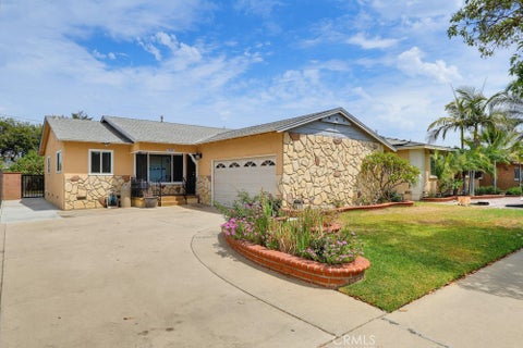 Photo of 2841 E 69th St, Long Beach, CA 90805 (MLS # DW26192805)