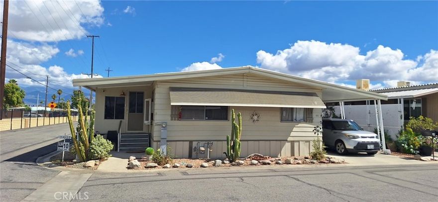 HUGE CORNER LOT PLANTY OF SPACE! Welcome to your new home! Come to enjoy newer carpeting in your extremely well-maintained mobile home! This house sits on a Giant coveted corner lot with lots of space behind the dwelling. This home has a large scenic picture window up front. The home boasts two large full bathrooms two baths. Both bedrooms have large nicely lit walk-in closets. The enclosed patio which has electric outlets, is perfect for your bonus space. You can use this extra living space any way you wish! Use for extra living space. Enjoy your private office or vanity room- or both!

The concrete driveway serves as both a place for your single automobile and extra patio space or use it entirely for your two car parking spaces. The property boasts two large security sheds, one of them contains the washer and dryer which is included in the sale. Central air and heating system for all seasons. This home located in Sunburst senior mobile home park and close to shopping, banks, restaurants.... The 55+ enclosed private park has a sparkling pool, a welcoming clubhouse and well-kept grounds. Your next party at the club house will get you a lot of compliments from friends and family! Come to see for yourself and make this yours today!