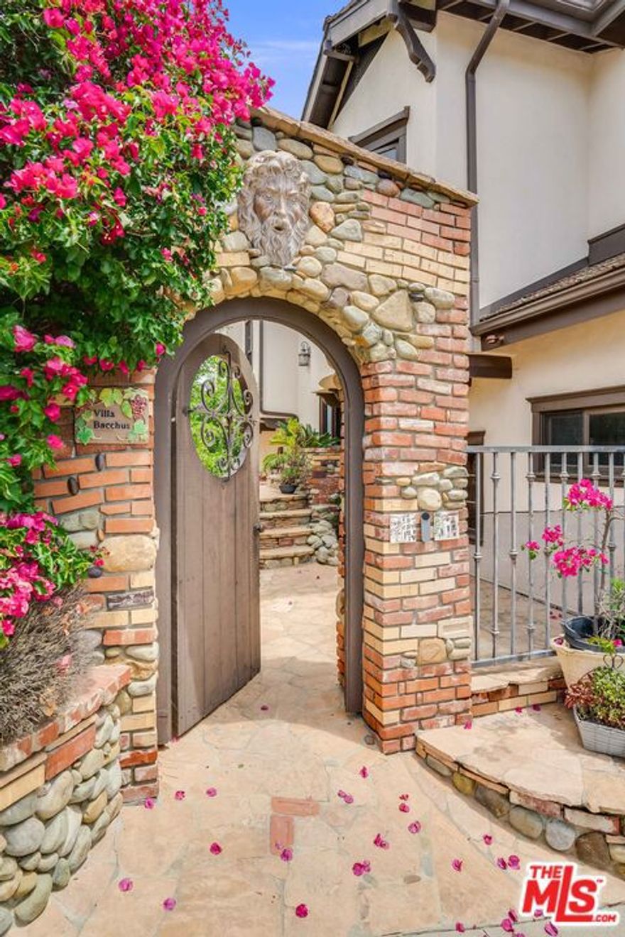 Absolutely stunning Topanga Villa! This luxury property boasts 360-degree panoramic views of the Pacific Ocean, Los Angeles and the Santa Monica Mountains. Completely remodeled, appropriately named Villa Bacchus, for the Roman God of wine and revelry, this sumptuous 3,200+ sq ft, four bedroom, three-and-a-half bath property is designed  for you and your family's joy and merriment. The upper level features a private bedroom suite with a gorgeous outdoor veranda and mountain and ocean views along with a custom designed walk-in closet. The luxe bath features a huge soak tub with ceramic Versailles limestone tile & a see-through fireplace also facing the suite. The gourmet kitchen is perfect for entertaining with top-of-the-line appliances, gorgeous custom cabinets, quartz counter-tops, large island & another double fireplace. The elegent dining and living room lead to the dramatic viewing decks just calling for an outdoor spa! The 2nd level family room comes complete with wet bar and also opens to a large view deck. Private entrance to separate  suite or office, three car garage and a  bonus meditation/workout/yoga room. Jaw-droppingly-beautiful hikes outside your door, a minute's drive to nearby Calabasas and twenty minutes to the beach.