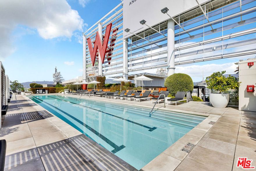 Experience modern luxury in this stunning 9th-floor corner residence at The W Hollywood. This spacious double-primary layout offers an exceptional blend of comfort, sophistication, and functionality in the heart of the city. Enjoy views of the iconic Pantages Theater and Hollywood Hills from your private corner balcony. Designed with convenience and style in mind, the home features motorized curtains, two mounted TVs, and a built-in Zoom Room Murphy Bed, ideal for guests or a versatile home office setup. The open-concept floor plan is complemented by floor-to-ceiling windows, premium finishes, and abundant natural light throughout.Residents have access to the exclusive amenities of The W Residences and The W Hotel, including a resort-style rooftop pool, state-of-the-art fitness center, 24-hour concierge, valet, and on-site security  offering a lifestyle of comfort and ease.