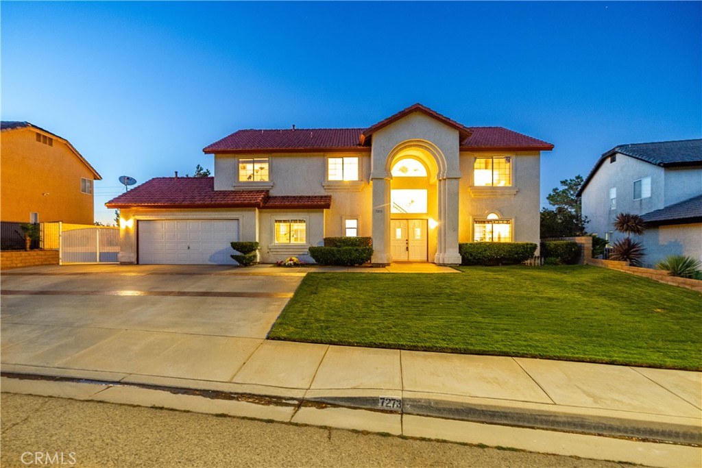 ***LIVE BEAUTIFULLY*** Welcome to this wonderful four-bedroom home in West Palmdale offering over 3,000 square feet of living space and gated paved RV access complete with full hookups and a dump station. Perfectly situated in a family-friendly community, this property combines spacious design with views of the valley. The interior features a formal living room and formal dining room that set the stage for gatherings and entertaining, while the expansive kitchen offers abundant cabinetry, a center island, and direct access to the family room where a cozy fireplace creates a warm and inviting atmosphere. A versatile bonus room provides additional space for a home office, playroom, or gym. The large primary suite is a true retreat with vaulted ceilings, a walk-in closet, and an ensuite bath complete with dual vanities, a soaking tub, and a separate shower. .Step into the backyard and you’ll find a covered patio and plenty of room for outdoor living, whether you envision a batting cage, a sparkling pool, or simply a relaxing space to enjoy the sweeping valley views. The home also boasts an upgraded HVAC system for year-round comfort. With no Mello-Roos, no HOA, and the rare advantage of an assumable 3.25% FHA loan, this West Palmdale gem offers a unique combination of value, convenience, and comfort at home!