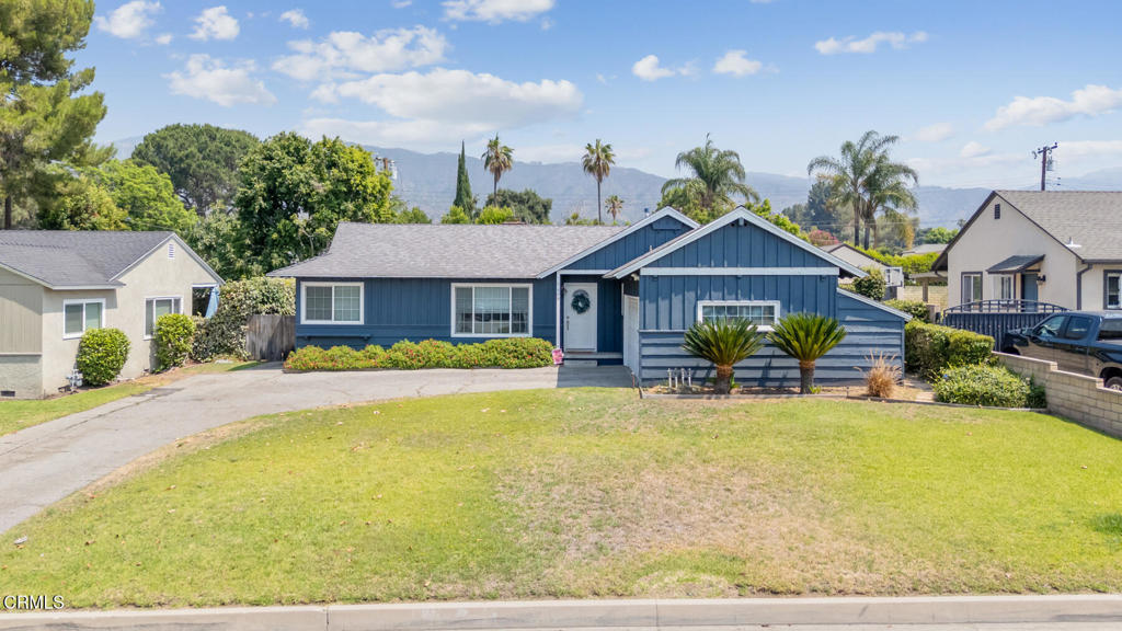 Located in a great area of Glendora, this sweet Ranch has a lot of offer. Entering the home, you'll see a wonderful fireplace and hardwood floors. To the right is the dining room and a beautiful remodeled kitchen, the perfect place for all those kitchen adventures you've been thinking about. With three bedrooms, an office or playroom, a full bath, a powder room and a laundry room, this house has everything to offer. It even has a chicken coop and a dog run! The sweeping backyard has a wonderful patio and awaits your imagination; expand the house or create the backyard of your dreams!