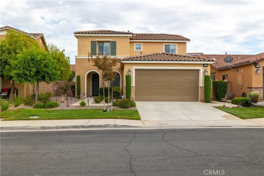 This beautifully upgraded 4 bedroom, 3 bathroom home offers the perfect blend of style and function, including a convenient downstairs bedroom and full bath. Fresh interior paint, new luxury vinyl plank flooring, and plush carpet add a modern touch throughout. The oversized kitchen is a chef’s dream with dual walk-in pantries, a built-in workstation, and abundant storage.



Enjoy open views with no front neighbors and a short walk to the community pool and park. The highlight is the expansive 8,200 sq. ft. backyard showcasing a brand-new pool with waterfalls and fire bowls, plus ample space under the patio cover, a grassy play area, and terraced slope with mature trees. Truly an entertainer’s paradise in sought-after Canyon Hills!