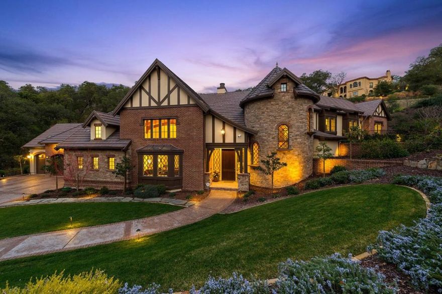 A Tudor style masterpiece. Unrivaled floor plan with excellent flow and openness. Everything has been thought of and perfectly designed. This grand estate features artisan crafted ceilings, stunning iron work, gorgeous entryway with centerpiece staircase, beautiful hardwood floors, chefs kitchen outfitted with Thermador, French doors leading to the backyard off every room, showcase wine cellar with latticed glass doors, custom window treatments by Hunter Douglas and more. Each bedroom is a suite with its own private bath and the office is an executive suite with a sitting area, French door to the hallway and French doors to the backyard. There is a 2nd office off the kitchen, and two of my favorite spots are the music room and the loft above. This home will not disappoint, built in 2016 yet feels brand new. Located in one of the most prestigious and elite private neighborhoods of Silicon Valley, The Highlands is a secluded, park-like setting offering serenity from the busy life of SV.