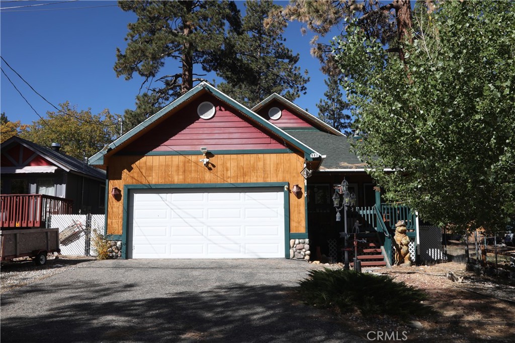 This 3 bedroom 2 bath home is conveniently located for easy access to hiking, biking, and outdoor activities. This mountain retreat has been well taken care of with a large kitchen connected to a living room and dining area. The master bedroom has a walk-in closet and a large double sink vanity. French doors from the master bedroom open up to a large Trex deck that spans the entire width of the home. Each room has its own heater and thermostat. The living room has a wood burning stove perfect for those weekend getaways. Convenient indoor laundry just off of the kitchen and a nice fenced front porch to enjoy the mountain air. This beautiful home is located just 10-15 minutes from downtown Big Bear. Most of the furniture is included with the property. Don't miss this one.