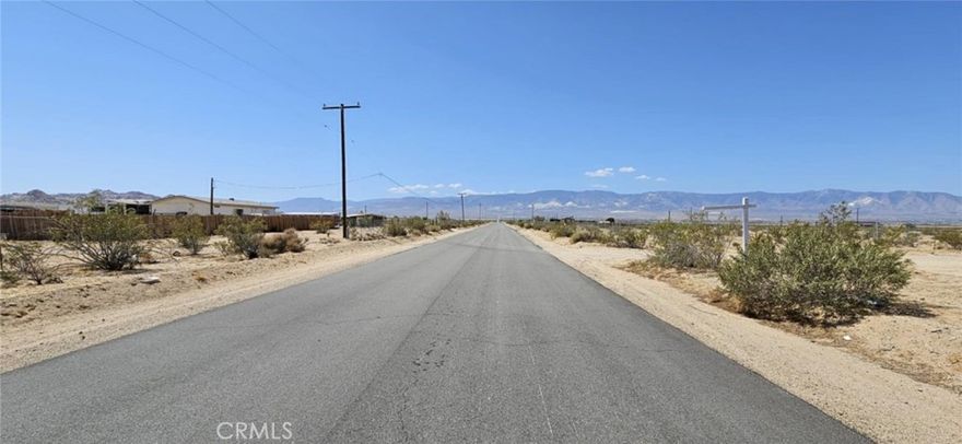 Don't miss this rare opportunity to own 5 acres of flat, buildable land in a peaceful area of Lucerne Valley, with power access and paved road frontage on Harrod Rd! Build, camp, or invest in this parcel and enjoy wide open views, beautiful sunsets, and easy access to town. Opportunities like this don’t come around often, drive by and check it out before someone else does! APN: 0452-151-52-0000. Latitude:34.511278, Longitude:-116.858898.