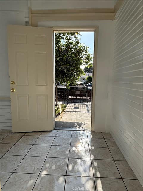 Photo of 6522 Estrella AVE, Los Angeles, CA 90044 (MLS # RS26173382)