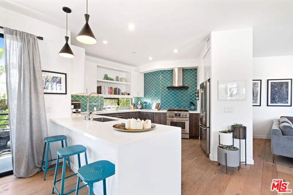 Photo of 11900 Washington Place, Los Angeles, CA 90066 (MLS # 26638543)