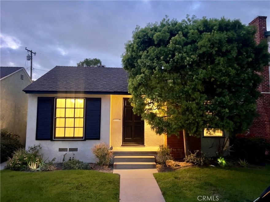 Charming single family property in the Belmont Shore neighborhood, featuring a 3-bedroom/1-bathroom front unit with updated kitchen, fireplace, and a large patio with a built-in BBQ, and a 1-bedroom/1-bathroom back unit located above a two-car garage. The location is known for its "Walker's Paradise" score, being within walking distance to shopping, dining, parks, ocean, and entertainment of 2nd Street.