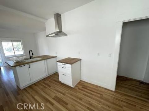 Photo of 1344 E 43rd Pl Pl, Los Angeles, CA 90011 (MLS # DW26069484)