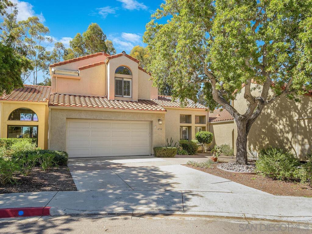 LIVE LARGE in the "Island in the Hills"! The largest model in Villa Dominique, this expansive 2513 sqft PUD is tucked back in one of the most desirable areas of Tierrasanta. Soaring ceilings greet you into the inviting Living Room with windows overlooking the serene natural setting. The generous kitchen opens to a breakfast nook and a family room, before leading you to the two downstairs bedrooms, a full bathroom, and a laundry room, as well as access to the 2-car attached garage. Upstairs, you'll find two primary suites, one with its own private balcony overlooking the surrounding natural beauty of the green space. A large, private patio with several access points within the downstairs completes the package. With only a few shared walls at the downstairs level (and no shared walls upstairs), this home feels like a free standing house! Community amenities include tennis courts and a secured overflow open parking area for add'l vehicles, boats, or RV's.