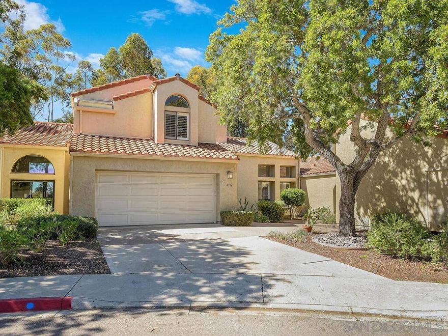 LIVE LARGE in the "Island in the Hills"! The largest model in Villa Dominique, this expansive 2513 sqft PUD is tucked back in one of the most desirable areas of Tierrasanta. Soaring ceilings greet you into the inviting Living Room with windows overlooking the serene natural setting. The generous kitchen opens to a breakfast nook and a family room, before leading you to the two downstairs bedrooms, a full bathroom, and a laundry room, as well as access to the 2-car attached garage. Upstairs, you'll find two primary suites,  one with its own private balcony overlooking the surrounding natural beauty of the green space. A large, private patio with several access points within the downstairs completes the package. With only a few shared walls at the downstairs level (and no shared walls upstairs), this home feels like a free standing house! Community amenities include tennis courts and a secured overflow open parking area for add'l vehicles, boats, or RV's.