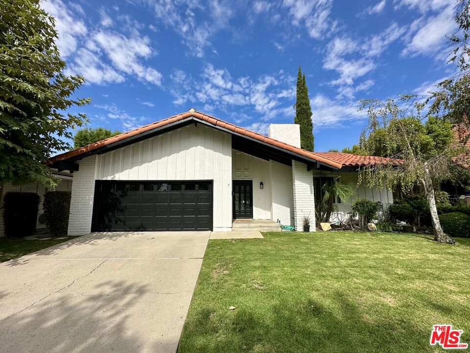Fantastic opportunity to lease a beautifully maintained 4-bedroom home in one of Westlake Village's most desirable neighborhoods! Located on a peaceful cul-de-sac in the sought-after Village Homes community, this home offers access to excellent nearby HOA amenities including a pool, tennis courts, clubhouse, serene greenbelt trails, & Evenstar Park. It's also situated in an award-winning school district. The home features a bright, open & flowing layout with formal living room offering a fireplace, large window, & skylight for abundant natural light. The dining room sits just off the living area, ideal for gatherings. Open-concept great room also features a skylight & connects seamlessly to the kitchen, which is updated with new stainless steel appliances, granite countertops, & stone backsplash. The family room has a sliding door that leads to a serene backyard with a pergola-covered patio, perfect for entertaining & outdoor dining, plus a grassy area with fruit trees. The primary suite includes dual closets, slider with direct access to the backyard, & an en-suite bath with spa-style tub/shower. There are also 3 additional well-sized bedrooms & a hall bathroom with tub/shower, new vanity & mirror. Additional features include hardwood floors in the main living areas, newer carpet in most bedrooms, recessed lights, central A/C, updated fixtures, & a two-car garage with direct access. All just minutes from shops, dining, & everything Westlake Village has to offer. Please do not disturb occupant.