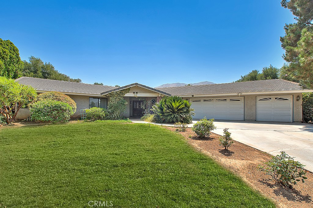 This exquisite custom-built estate is being offered for the very first time by its original owner. Nestled on an expansive 1.33-acre lot: Enjoy endless possibilities with this vast lot, perfect for outdoor activities, gardening, or even potential additions like a pool or guest house, this stunning residence boasts nearly 3,000 sq. ft. of living space with 4 spacious bedrooms and 4 Real dreamy Bedrooms with a luxurious primary bedroom that accommodates the most lavish furnishings & 4 Bathrooms to speed everyone happily on their way with a walk-in tile shower in the primary bath.
Step inside to soaring ceilings, light-filled living areas, and timeless craftsmanship throughout. The gourmet kitchen features granite countertops, premium cabinetry, and a layout perfect for both everyday living and grand entertaining.
Outside, the possibilities are endless. The sprawling grounds provide room for a pool, outdoor entertaining spaces, gardens, or even adding an ADU — all framed by the peace and privacy of this sought-after Jurupa Valley location. With ample space for RV parking, storage, or future enhancements, this estate delivers both sophistication and versatility.
Located just minutes from shopping, dining, and major freeways, yet tucked away on a private street, this rare property offers the best of both worlds — a serene retreat with modern convenience.
A once-in-a-lifetime opportunity to own a custom home of this caliber in Jurupa Valley. Schedule your private showing today.