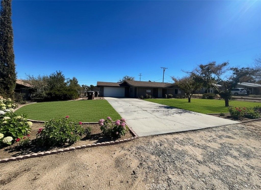 Photo of 7387 Aster Ave, Yucca Valley, CA 92284 (MLS # IV25256371)