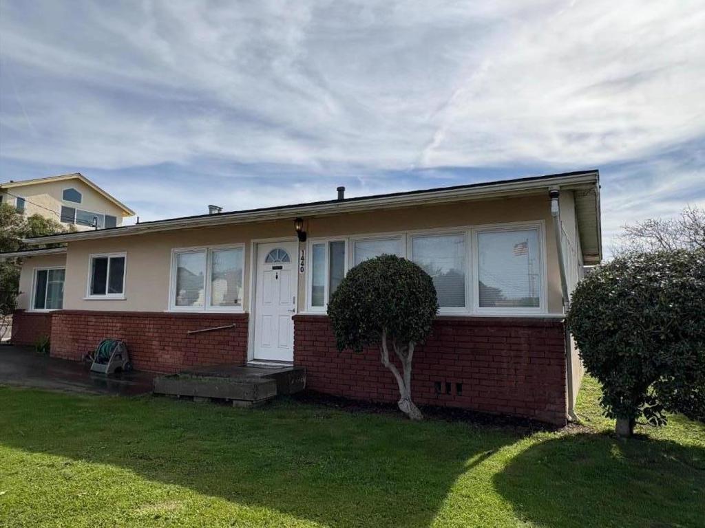 Situated in a desirable area of Seaside. Close to everything the Peninsula has to offer. Come enjoy living in the sunbelt in this adorable 2 bed 1 bath home. Hardwood flooring. The kitchen has been remodeled just 4 years ago with granite counter tops, stainless steel appliances, tons of storage & canned lighting. The bathroom has been handsomely remodeled with a shower stall and new vanity. Inside laundry with an extra sink. Double pane windows have been added to the entire home. There is a detached 2 car garage with newer doors. The back yard is large with many fruit trees and raised planting beds.