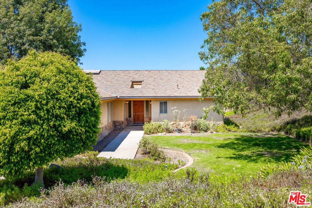 Fantastic opportunity! 4-bedroom 2 bath home on existing tree lined, acre sized lot. This is a large, flat lot with plenty of room for additional structures. Seller recommends that buyer checks with building department for additional square footage information. Rare find. Call listing agent to set up showing.