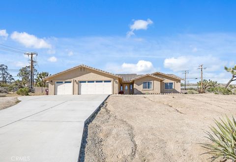 Photo of 57550 Old Mill Rd, Yucca Valley, CA 92284 (MLS # JT26062074)