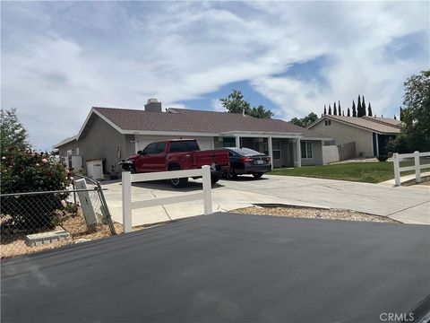 Photo of 11559 low Chaprral Dr, Victorville, CA 92392 (MLS # IG26085491)