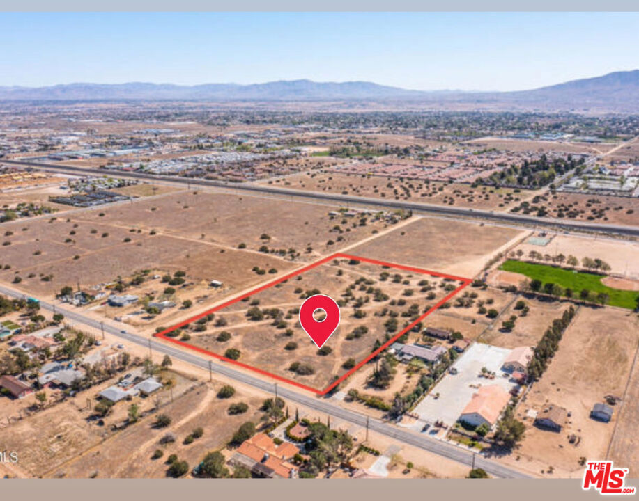 Prime Development Opportunity in Rapidly Growing Hesperia. Don't miss this rare opportunity to own 6.16 acres of flat, raw land in the heart of Hesperia's fast-developing residential corridor. Zoned MDR (Medium Density Residential), this versatile parcel allows for the construction of single-family homes, condominiums, or apartment buildings with up to six units making it ideal for builders and investors seeking long-term potential. Surrounded by custom homes and just 10 minutes from the I-15 freeway, this location offers both convenience and growth potential in one of the High Desert's most active market..NOTE: Property does not have a formal street address. The address provided is for general location reference only.