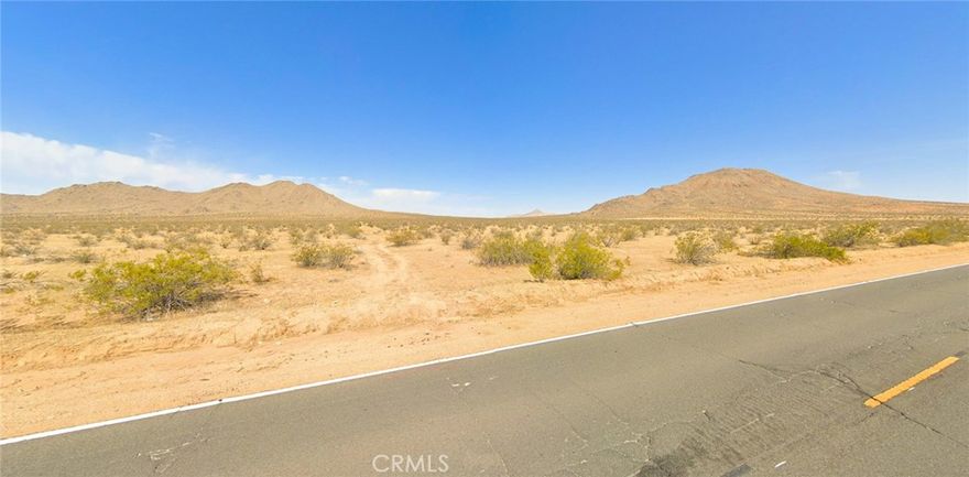 Prime Apple Valley Airport commercial land opportunity - 4.35 acres of commercial-zoned property just 3 minutes from Apple Valley Airport off of paved Dale Evans Parkway with exceptional development potential and strategic High Desert positioning. This flat, ready-to-develop commercial lot offers immediate access to aviation logistics, e-commerce fulfillment, and regional business opportunities with electricity nearby, paved road frontage, and flexible commercial zoning perfect for multiple business applications. Located only 7 minutes to Highway 15 providing direct access to Los Angeles (95 miles), Las Vegas (185 miles), and San Diego markets while maintaining lower operational costs than coastal California locations. Apple Valley's thriving economy features 4.2 million square feet of retail and office space with low vacancy rates, 350 days of annual sunshine, and pro-business environment attracting companies seeking High Desert advantages. The property sits within San Bernardino County's fastest-growing commercial corridor near the 6,600-acre North Apple Valley Industrial Specific Plan area with certified development sites and infrastructure support. Airport proximity creates premium value for logistics companies, aviation services, cargo operations, and businesses requiring freight access while flat topography eliminates grading costs and simplifies construction planning. Commercial zoning allows diverse business uses including retail, office, industrial, warehouse, and specialized aviation-related services with utilities available nearby and septic/well requirements typical for rural commercial development. This rare combination of airport access, highway connectivity, commercial zoning, and affordable High Desert pricing represents exceptional value at $60,000 for investors, developers, and businesses seeking strategic Southern California positioning. Whether developing immediately or holding for appreciation in this expanding market, this airport-adjacent commercial land offers flexibility and growth potential in Apple Valley's proven business environment. APN 0472-331-12-0000 at coordinates 34.56848, -117.2082 for GPS navigation. Perfect timing to secure commercial land in the High Desert's most dynamic growth corridor where aviation access meets interstate commerce.
