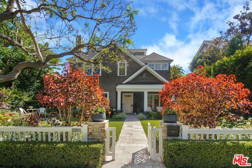 Gorgeous Designer Done Hampton-style home that can not be replicated! This updated 2016 custom build was redone in 2021 and blends refined taste and casual elegance located just steps away from San Vicente, Montana, the bluff and the Canyon. Re-decorated and re-imaged in 2022, this beautiful home features three levels of entertainment, top of the line upgrades and the ultimate indoor-outdoor layout. As you enter the gated front yard you will see the exquisite landscaping, the inviting front porch and the amazing curb appeal. The front door opens to a sunlit entry with living room, dining room on the left and office/study and elevator to the right. As you move forward, the state-of-the-art gourmet kitchen and great room create the ideal flow and open seamlessly to an outdoor patio complete with a built-in BBQ, private backyard and fruit trees. An elevator services all floors including the basement which is almost 2,400 square feet including 2 bedrooms (en suite), media room/theater, kitchen, den & storage. Upstairs there are four bedrooms which again are all en suite and as a bonus rooftop deck with spa and peek a boo ocean views. This is a Santa Monica retreat and not to be missed!
