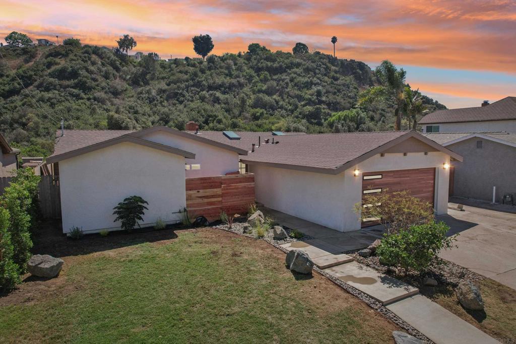 Beautifully remodeled home in the peaceful yet central enclave of Bay Park! This home stands out for its high end finishes, extra half bath, 4th bedroom, and oversized master suite with soaking tub and walk-in closet. The home backs up to Tecolote Canyon, meaning no rear neighbors and beautiful views of nature! The tranquil location will make you feel 1,000 miles from the chaos of the city, but you will be in one of San Diego's most central neighborhoods, only 10-15 minutes from Downtown, Balboa Park, Ocean Beach, Pacific Beach, Mission Valley, and all the rest that central San Diego has to offer. New electrical, plumbing, roof, AC, and more. Completely turnkey and move-in ready! Come and relax on the large covered patio while kids or pets play in the spacious yard. Don't miss out on this amazing opportunity!
