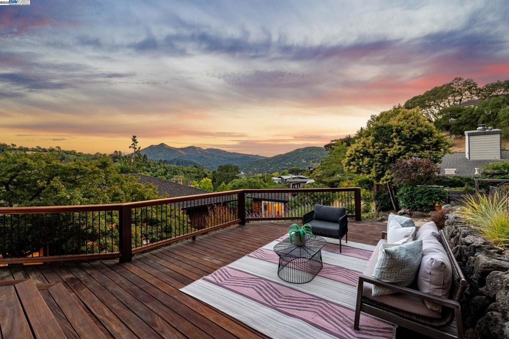 At 184 Hilldale Drive, life unfolds at a peaceful pace. Perched on an expansive view lot at the edge of the neighborhood, this 4 bed/3 bath home feels like a private retreat—where mornings begin with coffee on the deck as the sun rises over awe-inspiring Mt. Tam, and evenings are spent with friends around the built-in firepit. Though serene and private, it’s just minutes from downtown San Anselmo’s shops, cafes, and excellent schools, offering the perfect blend of retreat and connection. Designed for indoor-outdoor living, the property features expansive decks, a greenhouse, gardens, and pathways through mature landscaping. A detached office provides a quiet space for work or creativity, while a trampoline invites fun for all ages. Inside, vaulted ceilings, oversized windows, and radiant heated floors create a light-flooded interior that feels inviting and inspiring. The spacious primary retreat is thoughtfully set apart, with high ceilings, a private deck, spa bath with jacuzzi tub, separate shower, and walk-in closet. With 4 bedrooms, 3 updated baths, and a 2-car garage, there is room for everyone to live, work, and play. Lovingly maintained by the same family for over 25 years, this home embodies the essence of San Anselmo living—community, nature, and connection.