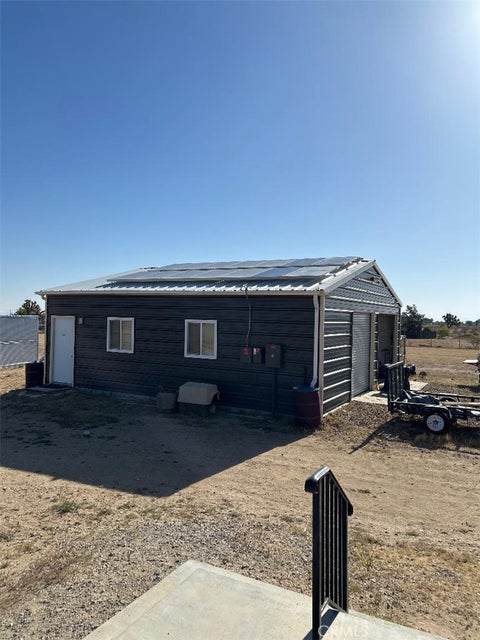 Photo of 6026 Dos Palmas RD, Phelan, CA 92371 (MLS # HD26159208)