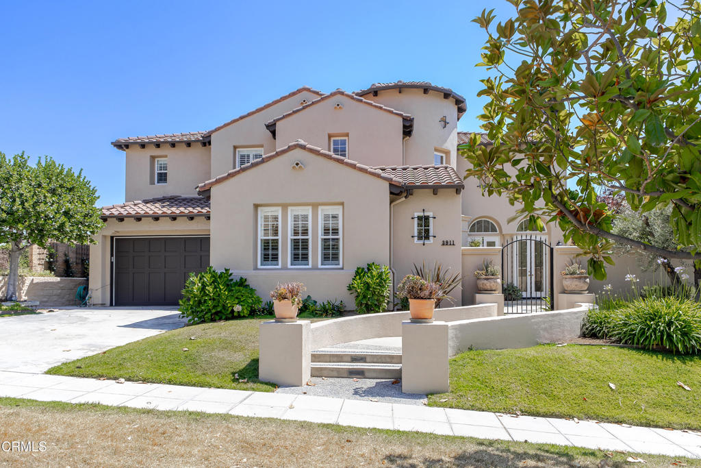 Set against the foothills of Altadena, this Tuscan inspired home has it all! Located in the gated community of La Vina, this property exudes old world charm starting at the front courtyard with its pebbled mosaic design and flows into the formal entry hall. The formal living room is anchored by a fireplace, has soaring ceilings, large windows and french doors that open to the courtyard. The spacious formal dining room is nearby and offers views overlooking the backyard. An open concept kitchen with a large island, walk-in pantry and breakfast area is adjacent to the family room. The family room shares a pass through fireplace with the breakfast area and opens up the backyard, ideal for entertaining. A flex room downstairs makes for an ideal office or library. The 4th bedroom is downstairs as well, with an ensuite bathroom. Completing the main floor is a powder room, laundry room and direct access from the garage into the house. Upstairs is a loft area that makes for a great den or playroom and has a built-in desk. Two bedrooms are attached to the loft area and share a Jack and Jill bathroom. The primary bedroom suite is the jewel upstairs featuring a generous bedroom, built-in dresser, screened patio, and views overlooking the backyard and beyond. The primary ensuite bathroom has two sinks, separate shower and tub, sitting room and oversized walk-in closet. Keeping with the Tuscan style, carved wooden doors, accent lighting and grapevines growing over the patio add a special touch. The backyard hosts two patio areas, one covered patio off the family room and an additional patio with outdoor fireplace, the perfect place to enjoy your morning coffee. A beautiful water fountain adds to the backyards ambiance and the views to Catalina on a clear day. The home has 28 solar panels that are owned and paid off and a water purification system, which includes a softener plus a reverse osmosis system for pure water in the kitchen. La Vina has a community pool and children' s park. Nearby are hiking trails and Loma Alta Park, with tennis courts, picnic areas and recently refurbished playgrounds.