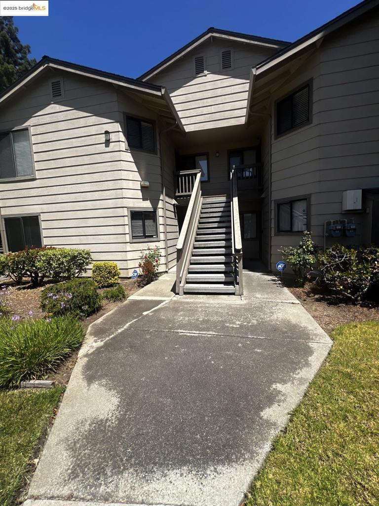 Discover this inviting ground-level condominium situated in the Foxboro Downs community. The unit is located in a peaceful setting at the back of the complex, which is quiet and private. An ideal setup for those seeking comfortable, accessible living. Featuring two bedrooms and one full bathroom, this condo offers 869 sq ft of living space. Outdoor access is seamless with a small patio area, great for relaxing or casual entertaining. The community is known for its amenity-rich and commuter-friendly location, offering easy access to Hercules Transit Center, BART, I-80, and Highway 4. A nearby pod mall includes shops, restaurants, and Starbucks, while outdoor lovers will enjoy this home’s short proximity to bayfront parks, walking trails, and outdoor leisure.