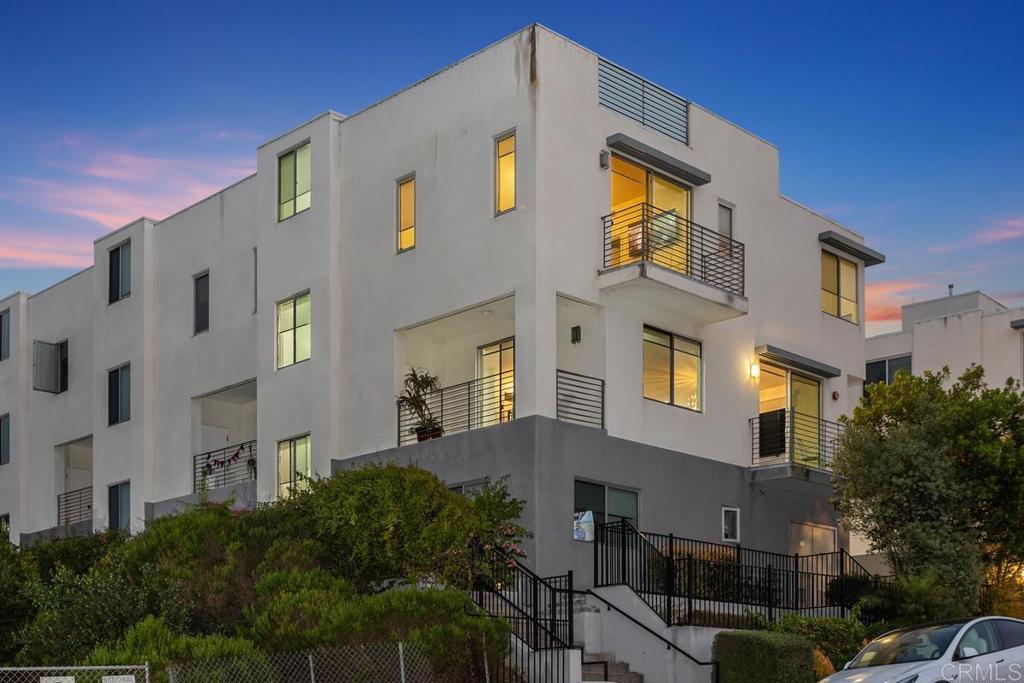 Luxury View Property in La Costa, Carlsbad located across the street from the Omni La Costa Resort and Spa. Built in 2017, 180 degree views of the golf course and La Costa Hills abound where the Rat Pack from Hollywood first settled. This unique property is a luxurious and elegant townhome. Replete with a rooftop deck with unparalleled views toward the ocean. 10 minute drive to the beach in Carlsbad/ Encinitas. Less than 5 miles to the beach as the crow flies. It offers a sophisticated lifestyle with features that cater to both comfort and modern living. 4 bedrooms, 3.5 bathrooms, primary suite with large bedroom and bathroom ensuite. 4 stories with full bedroom and ensuite bath located on first floor. Smart home features include USB fast-charging wall outlets in every room, dimmer-controlled lighting throughout, and an EV charging outlet in the attached two-car garage. California closets, central vac system, stainless KitchenAid package at kitchen, counter depth refrigerator, high-end whole house Puronics water filtration system (reverse osmosis at kitchen sink and salt based), high end shades, chandelier in dining, can lighting, fresh paint and pile carpet in bedrooms, luxury vinyl throughout common areas, central VAC systemn, washer and dryer and 2 car attached garage. Don't miss this one!!!