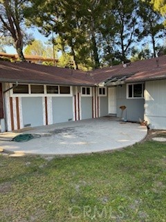 Front view of entrance with rounded porch.