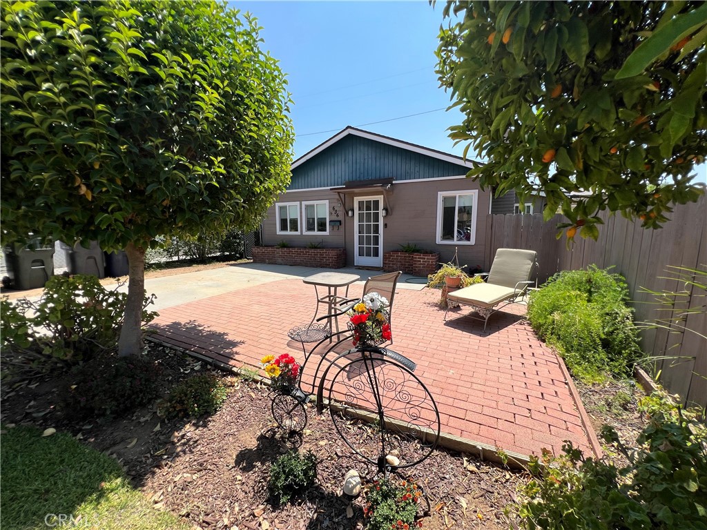 Pride of ownership. Charming Redlands home-Immaculately maintained two bedroom/one bath in coveted South Redland. This home boasts a fully remodeled kitchen with updated appliances and an updated bath, brand new roof, and energy efficient double paned windows throughout. The living room has a wood burning fireplace. The generous front yard offers space to entertain or garden. Backyard has plenty of room for entertaining and gardening. Nestled in an established community near local schools, hospitals, shops and parks — perfect for first time buyers, downsizers or savvy investors.