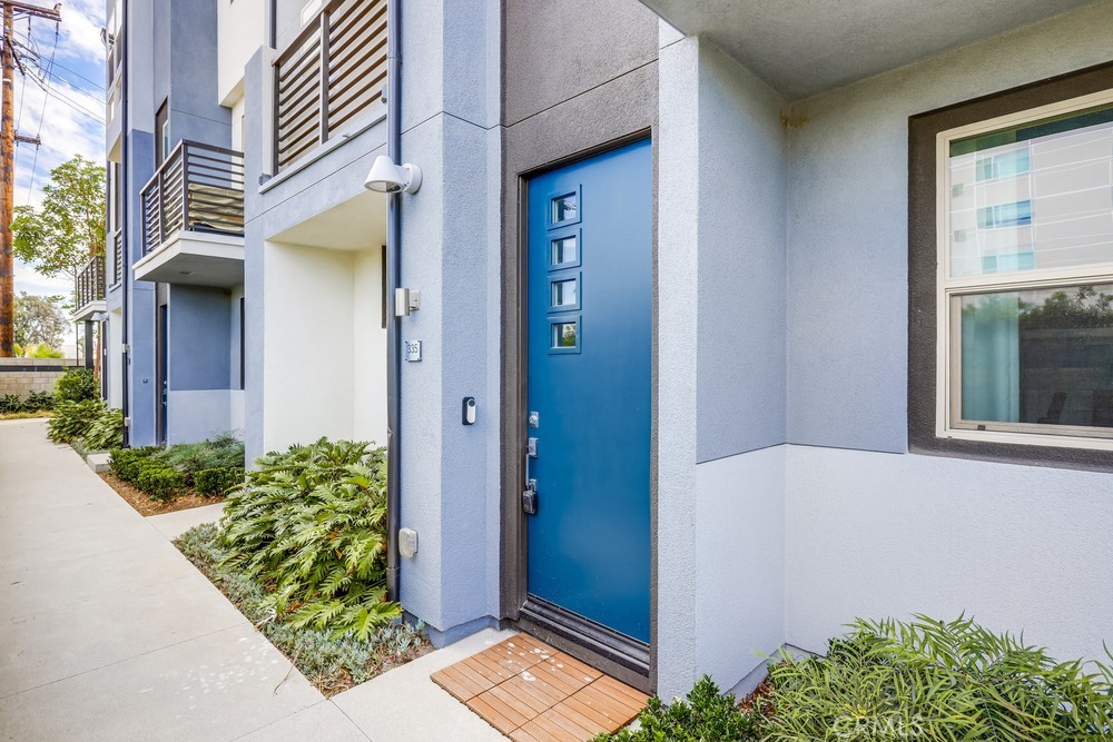 Welcome to MDL, a gated, amenity-rich community located in Uptown Irvine. This light-filled townhouse features a three-story design. The first level contains a 2-car, direct-access garage. The second is the main living level and boasts a generous open floor plan that includes a family room with a deck, a powder room, dining area, and a chef's kitchen with quartz countertops and stainless steel appliances. The third floor has dual primary suites. Enjoy a central courtyard with a resort-style pool with a spa and cabanas, an outdoor fireplace, seating areas, BBQs, a dining terrace, a tot lot, and a clubhouse. Located close to great retail and dining centers such as The District, Park Place Center, University Town Center, and South Coast Plaza, as well as Mason Regional Park, Back Bay Newport, and John Wayne Airport. HOA dues are included; small pets are considered with an additional deposit.