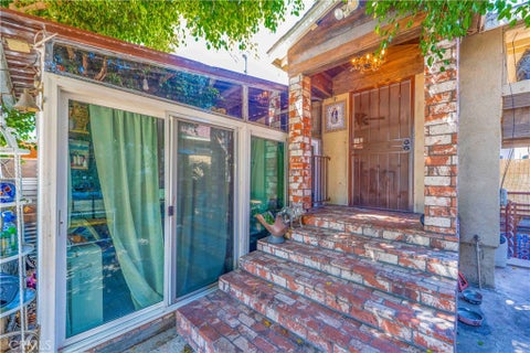 Photo of 307 N KERN Avenue, East Los Angeles, CA 90022 (MLS # MB26193479)