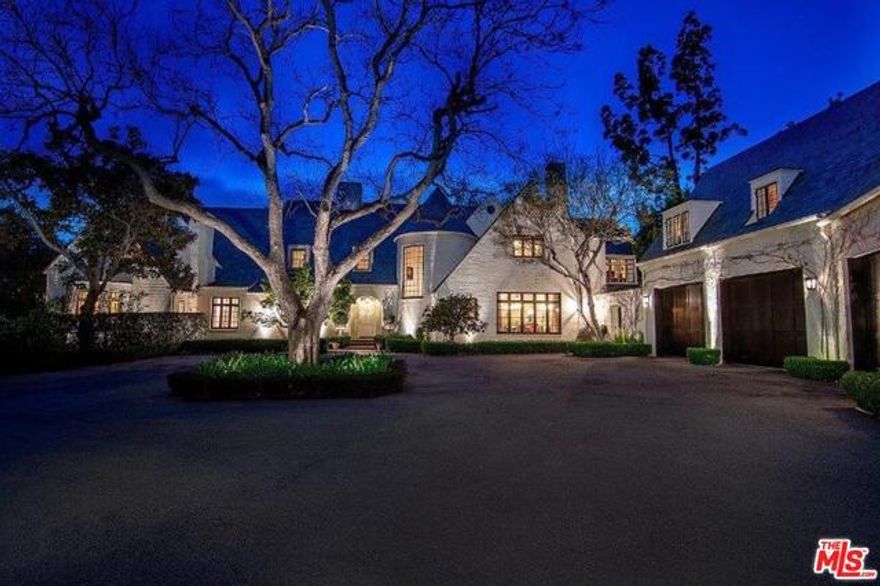 This World-Class Celebrity Compound is poised on a rare double lot of apx. 1.2 acres in the heart of Brentwood. Set behind double gates, this property is extremely private & offers an enchanting setting w/lushly landscaped grounds, captivating fa&#195;&#402;&#194;&#167;ade, & old-world authenticity. Enter onto the large motorcrt & be transported to the European countryside. Step into the formal foyer w/wood-burning fp & distinctive 2-story stairwell tower w/spiral staircase. Grand formal living rm, formal dining rm, family rm, billiard rm, 2 powders, & gourmet farmhouse-style kitchen w/breakfast rm. The master suite is located in its own wing on the 1st floor & features a sitting rm, fp, beautiful bth, walk-in closets & dressing rm. Upstairs 4 bdrm suites & office w/loft. The seductive backyard offers a serene setting & incredible space for entertaining w/abundant patio space, fp, BBQ, sprawling lawns, large pool w/pavilion & championship tennis court. There is also a gym, guest quarters & recording studio.