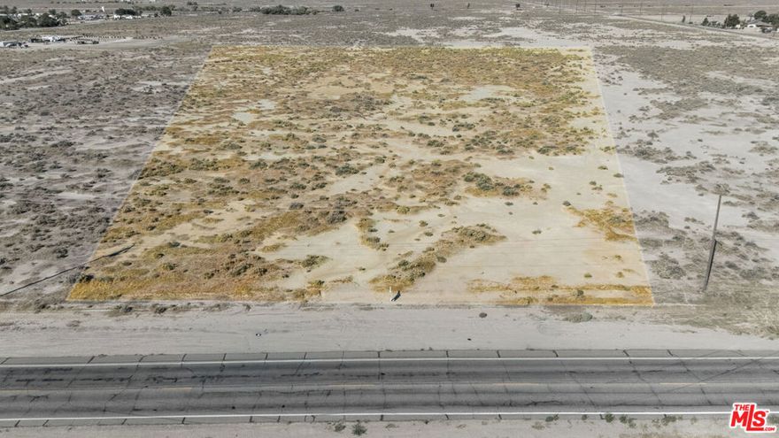 Unlock the full potential of your vision on this exceptional 2.39-acre parcel. Zoned A-1 for Limited Agricultural Residential use, this land is a gateway to a life of freedom and self-sufficiency, all while serving as a powerful long-term asset. Build your legacy on a property that accommodates everything from a custom home and hobby farm to a spacious retreat. This is a rare find in a prime location. With easy access to Edwards Air Force Base, Hwy 14, and Hwy 138, you get the serenity of a rural setting combined with the convenience of a strategic location. The flat topography makes development straightforward. This is your chance. A property with this much flexibility and potential for both lifestyle and investment is a true rarity. Consider acquiring the adjacent lot to create nearly 5 acres of unlimited potential! Utilities are believed to be nearby, but buyers and their agents are advised to independently verify all utility availability, capacity, and connection costs