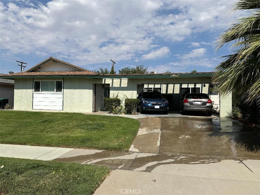 Welcome to this Quaint Established Neighborhood in Palmdale. This larger 1721 s.f home has 3 nice sized bedrooms, 2 bathrooms, an upgraded kitchen, family room with a fireplace all ready for your entertaining and an additional very large comfy great room with so many uses we can't name them all.
Beautiful front and back lawns, with planters, raised beds, fruit trees, storage, private block wall and covered patio deck for your entertaining or peaceful nights of starring at the stars. In the front there is a covered larger carport. The backyard is large enough to add a spa or pool if desired.
The home is close to the 138 and 14 for easy access to all of your needs such as schools, Food, shopping, medical and more. This home has had the same caring owners for over 45+ years and you will feel the love in the home. Come and make it your own. To top it off this home has fully paid for solar system..
