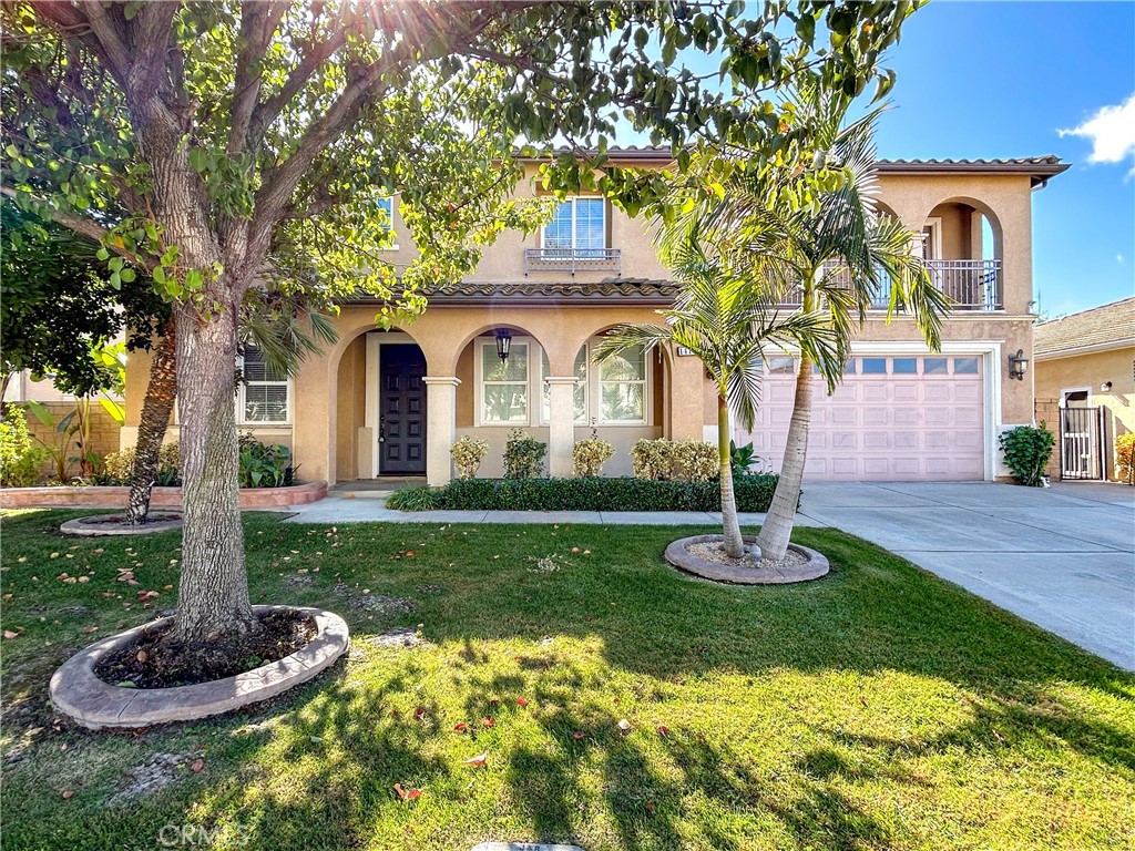 Explore this Beautiful 6 bedroom, 4.5 bathroom home with paid off solar in a quiet neighborhood. Highlights include crown molding, ceiling fans. Downstairs features include a formal living room, dinning room and a family room with fireplace and a bedroom with full bathroom near the kitchen. The kitchen features modern appliances, a walk-in panty, a butler's pantry, lots of cabinet spaces, and recessed lighting. Back and front yards are nicely landscaped, and the backyard boasts a covered patio and built-in BBQ.