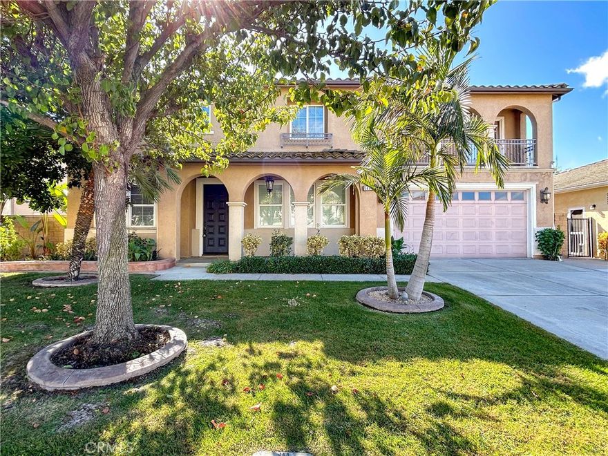 Explore this Beautiful 6 bedroom, 4.5 bathroom home with paid off solar in a quiet neighborhood. Highlights include crown molding, ceiling fans. Downstairs features include a formal living room, dinning room and a family room with fireplace and a bedroom with full bathroom near the kitchen. The kitchen features modern appliances, a walk-in panty, a butler's pantry, lots of cabinet spaces, and recessed lighting. Back and front yards are nicely landscaped, and the backyard boasts a covered patio and built-in BBQ.